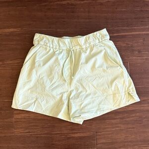 Lululemon lime green exercise shorts in size S